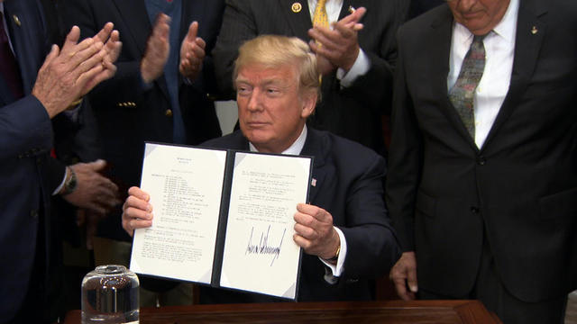 1211-cbsn-trumpspacesigning-1460104-640x360.jpg 