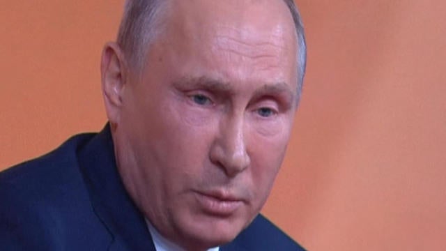 1214-en-putin-palmer-1462652-640x360.jpg 