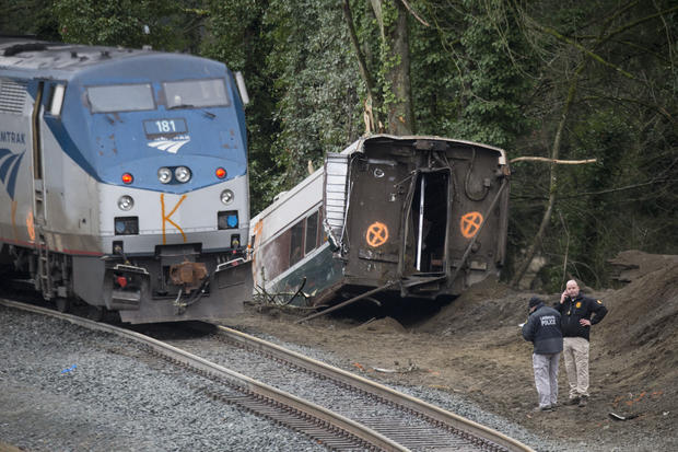 Amtrak Train Derailment South Of Tacoma, Washington Leaves Train Car Dangling Onto Highway 