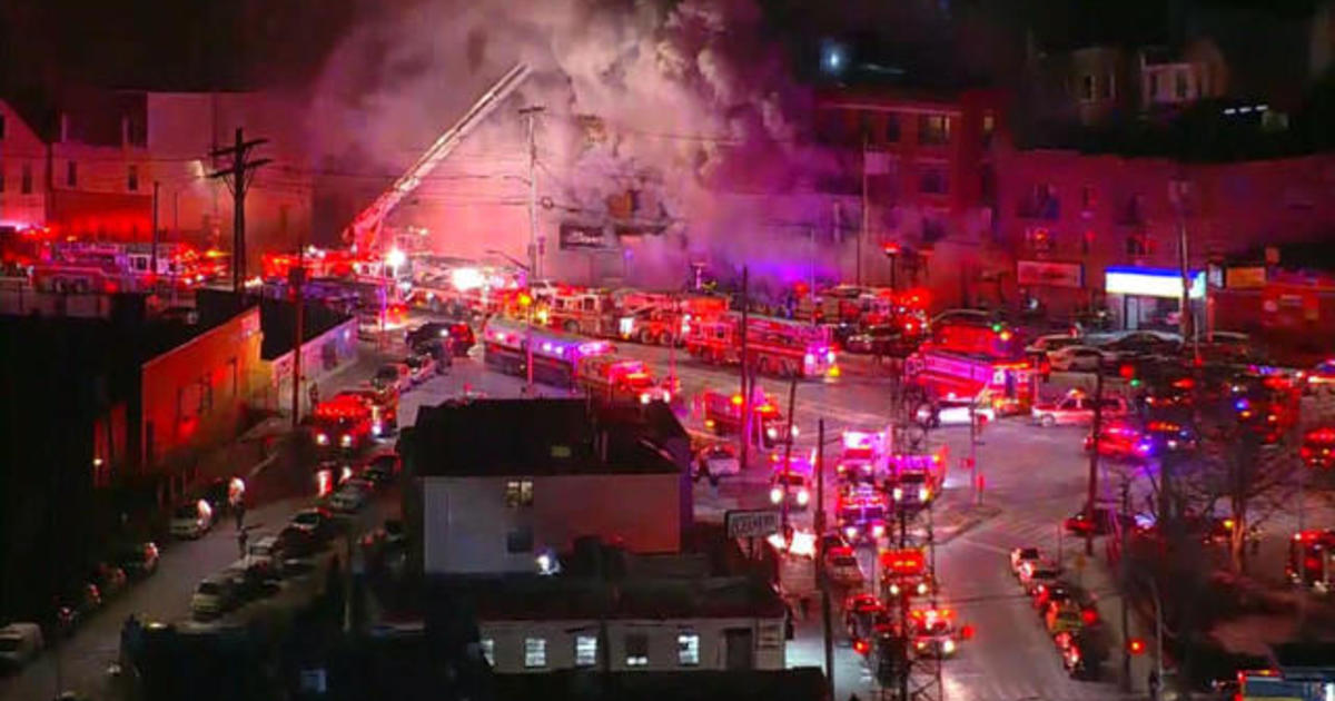 Fire tears through building in the Bronx CBS News