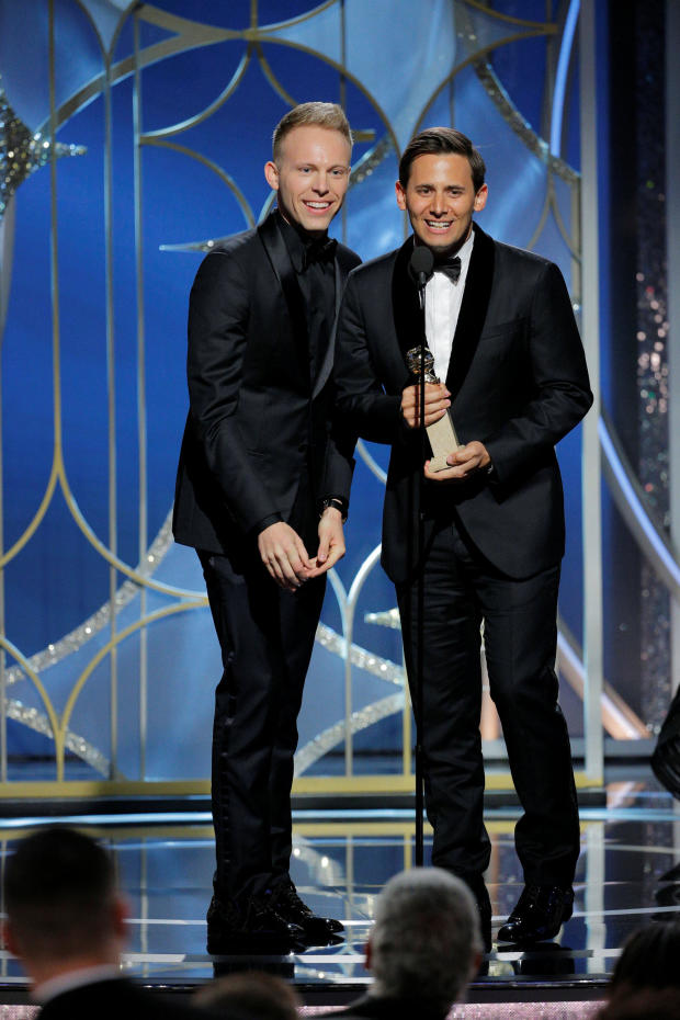 Justin Paul and Benj Pasek accept the award for Best Original Song Motion Picture for "This Is Me, The Greatest Showman" at the 75th Golden Globe Awards in Beverly Hills 