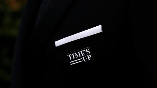 Actor Ewan McGregor wears a "Time's Up" pin on his all-black tuxedo at the 75th annual Golden Globe Awards in Beverly Hills, California, Jan. 7, 2018. 