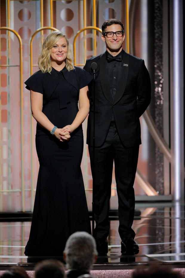 Presenters Amy Poelher and Andy Samberg at the 75th Golden Globe Awards in Beverly Hills, California 