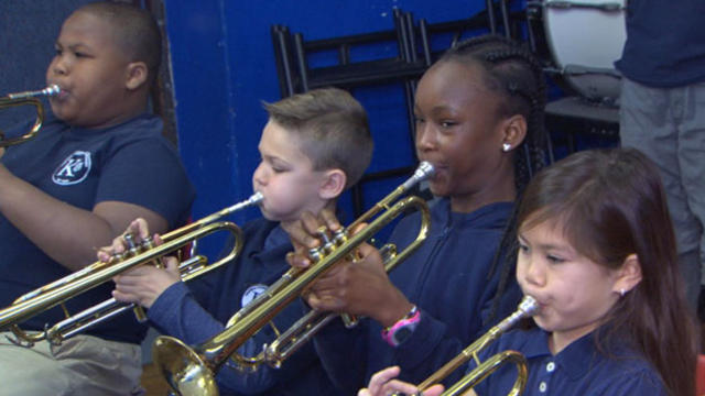 Marching to their own beat: Brass band keeps youngsters from gang