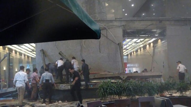 Ambulances are seen following reports of a collapsed structure inside the Indonesian Stock Exchange building Jakarta, Indonesia, 