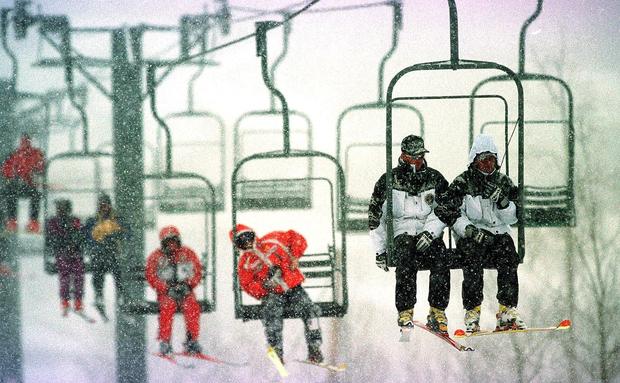 Recreational skiers on a lift at Vail Ski Resort a 