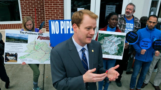 Virginia Delegate-elect Chris Hurst, D-Roanoke, speaks during a news conference prior to a meeting of the State Water Control Board in Richmond, Va., Dec. 6, 2017. 
