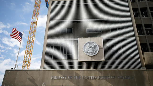 The U.S. national flag flutters at the U.S. Embassy in Tel Aviv 