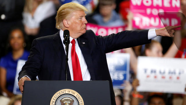 FILE PHOTO: U.S. President Trump appears on stage at a rally in Harrisburg 