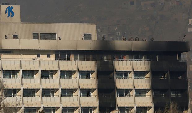 Afghan security forces are seen at the roof top of the Intercontinental Hotel in Kabul,ÊAfghanistan 