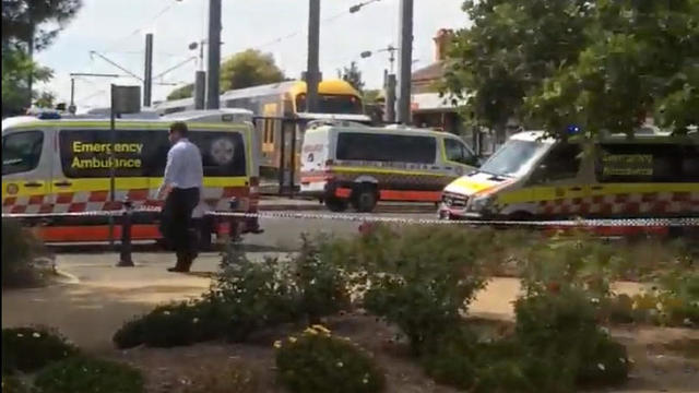 Ambulances arrive at the Richmond Station where a train has derailed, northwest of Sydney 