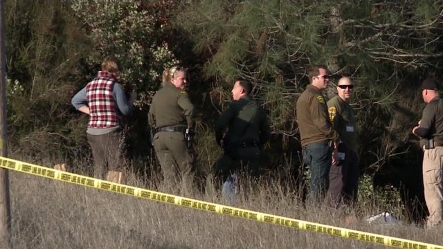 Crews work the scene after human remains were found in a state recreation area in Placer County, California, on Jan. 27, 2018. 