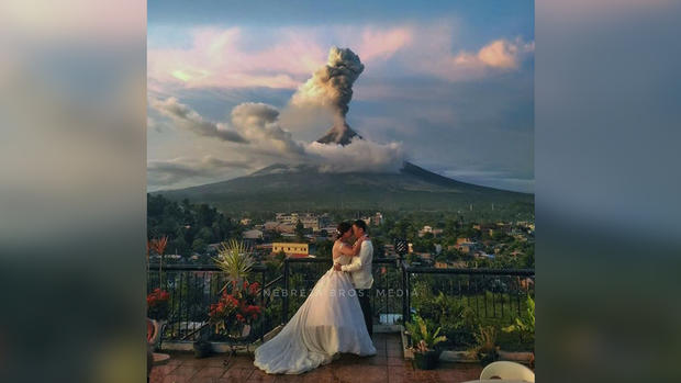 Wedding Photographer Captures Stunning Photo As Volcano Erupts 