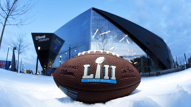 Northeastern University student Eddie Ferrini shows off his tattoo listing the New England Patriots' Super Bowl victories, including Super Bowl LII, which Ferrini got a week before the big game. 