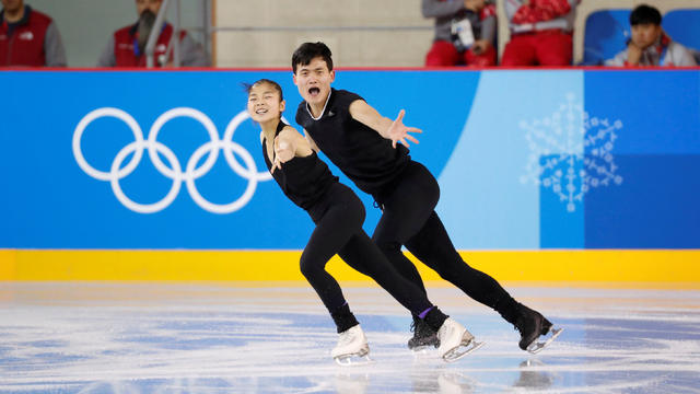 North Korea's figure skaters Ryom Tae Ok and Kim Ju Sik take part in a training session at the Gangneung Ice Arena in Gangneung 