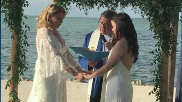 Miami teacher Jocelyn Morffi and her wife are seen at their wedding in this picture provided to CBS station WFOR-TV by Beatriz Gaviria Lopez. 