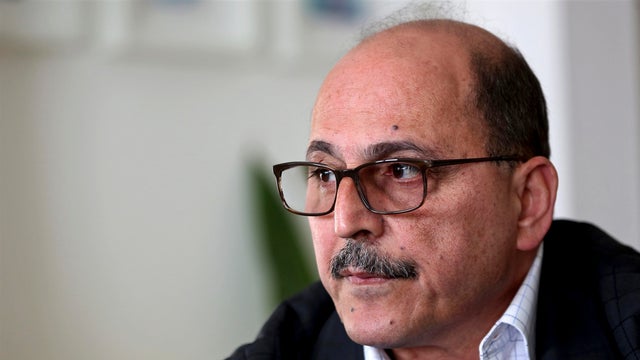 Amer Othman, 57, speaks during an interview with The Associated Press in Amman, Jordan, on Feb. 15, 2018. 