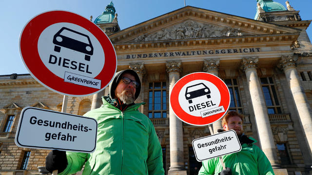 Greenpeace environmental activists protest in front of Germany's Federal Administrative Court in Leipzig 