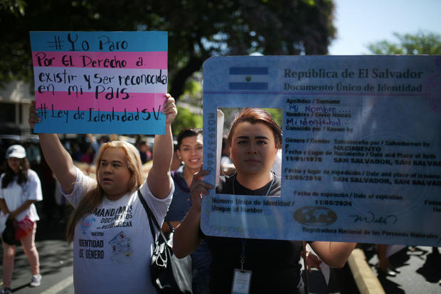 Activist and members of the LGBTQ community participate in a march to call for an end to violence against women during International Women's Day in San Salvador 