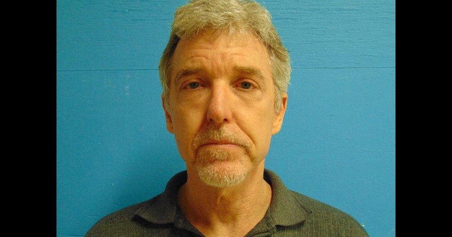 Doctor accused of murdering 2 appeared "paranoid," feared Russian mob(00)