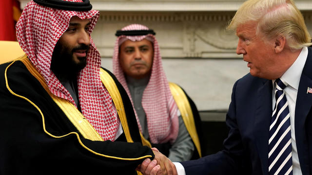U.S. President Donald Trump shakes hands with Saudi Arabia's Crown Prince Mohammed bin Salman in the Oval Office at the White House in Washington 