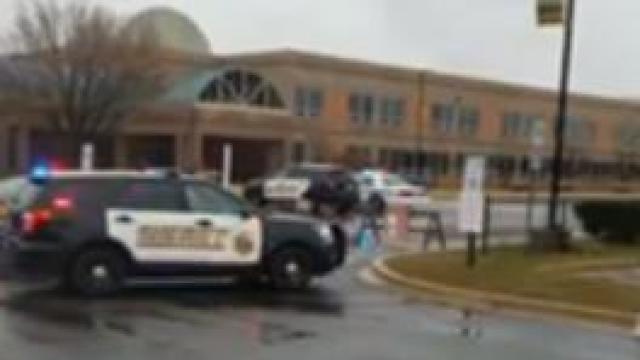 Crews work the scene after a shooting at Great Mills High School in Great Mills, Maryland, on March 20, 2018. 