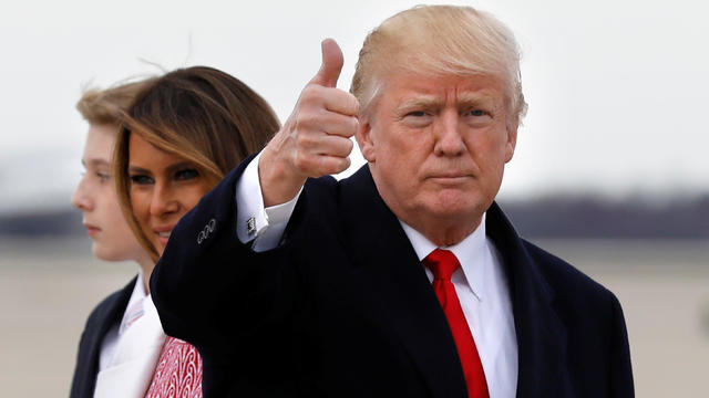 President Donald Trump and first lady Melania Trump arrive at Joint Base Andrews 