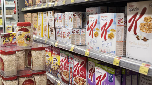 Boxes of American cereal brands are displayed for sale at a 