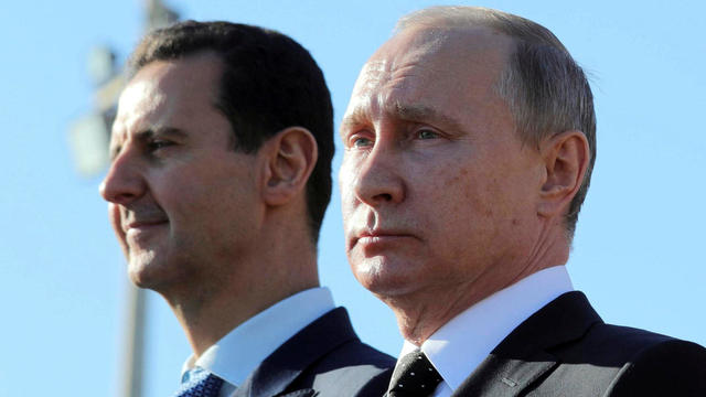 Russian President Putin and Syrian President Bashar al-Assad visit the Hmeymim air base in Latakia Province 