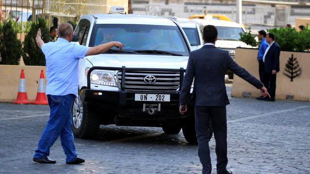 The United Nation vehicles carrying the Organisation for the Prohibition of Chemical Weapons (OPCW) invspectors arrive in Damascus 