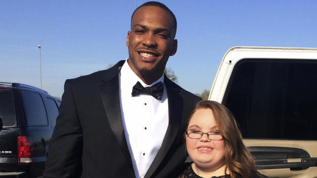 Lindsey Preston stands next to San Francisco 49ers defensive back Don Jones at her prom in Moulton, Ala., on April 13, 2018, in this photo by Lindsey's mom Kristi Martin. 