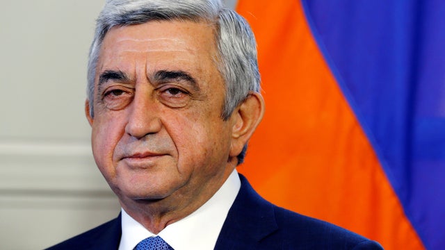 FILE PHOTO: Armenian President Serzh Sargsyan poses at the opening of talks in Geneva 