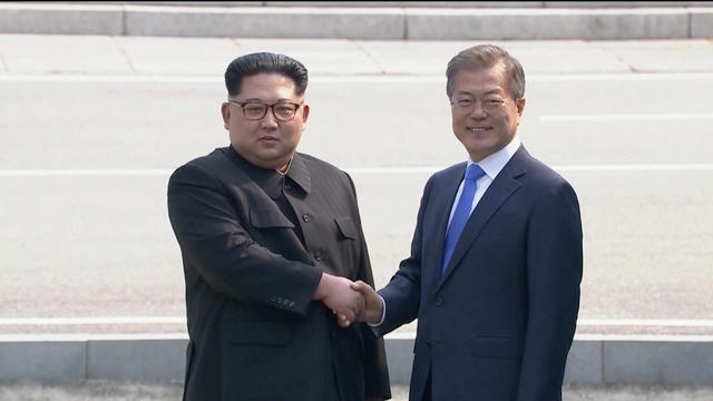 North Korean leader Kim Jong Un shakes hands with South Korean President Moon Jae-in at the inter-Korean summit at the truce village of Panmunjom, in this still frame taken from video 