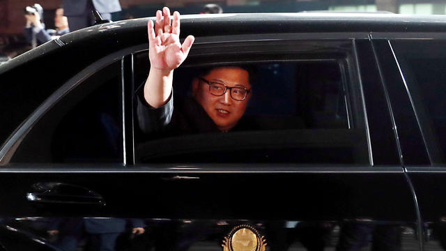 North Korean leader Kim Jong Un bids farewell to South Korean President Moon Jae-in as he leaves after a farewell ceremony at the truce village of Panmunjom 