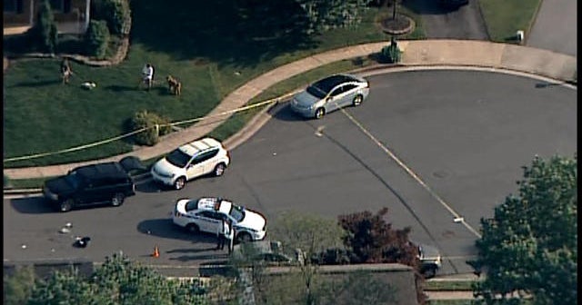 Police search for suspect in murder of Baltimore County cop - CBS News