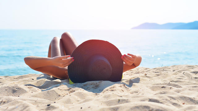 Sunbathing on beach 