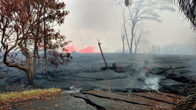 Lava is seen spewing from fissures in Pahoa, Hawaii 