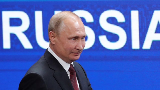 Russian President Putin attends a session with Japanese PM Abe at the St. Petersburg International Economic Forum 