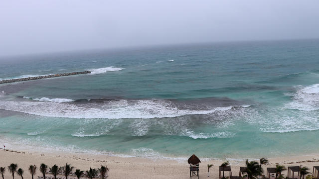 A general view shows an empty beach as subtropical storm Alberto approaches Cancun 