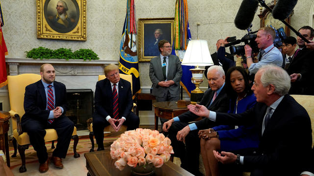 Senator Bob Corker (R-TN) talks to U.S. President Donald Trump and Josh Holt, an American missionary who was released by Venezuela, in the Oval Office of the White House in Washington 