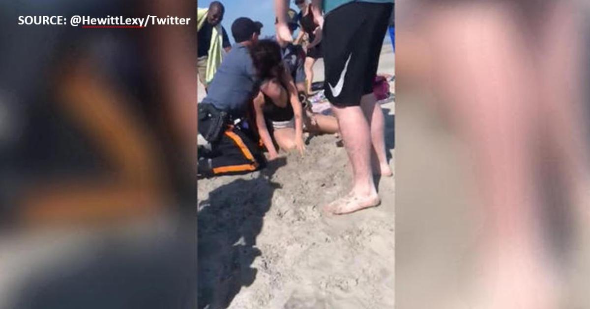 Police Launch Probe After Video Shows Officer Punching Woman On Beach Cbs Los Angeles 