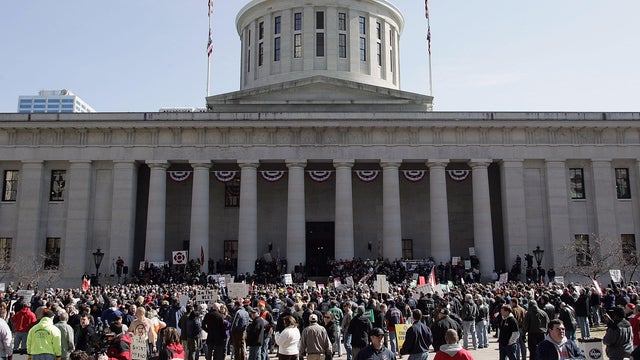 Protestors Rally At Ohio Capitol As Kasich Delivers State Of State Speech 