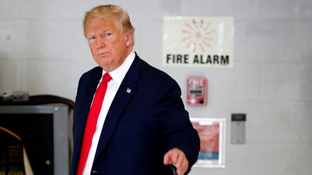 U.S. President Donald Trump walks from a meeting with families of the Santa Fe, Texas, school shooting in Houston, Texas 