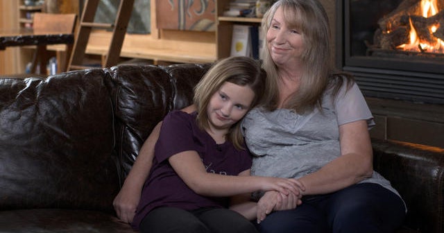 "I know that I have another mom right here" - CBS News