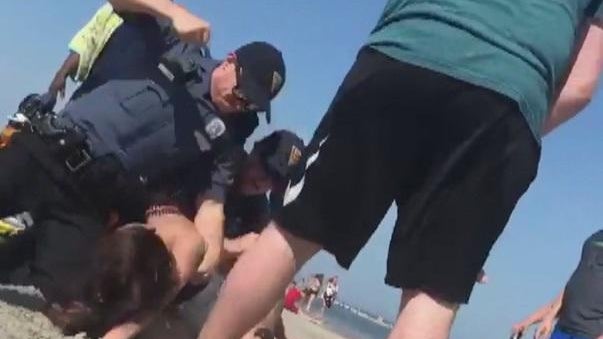 ctm-0606-woman-punched-by-nj-cops-on-beach-emily-weinman.jpg 