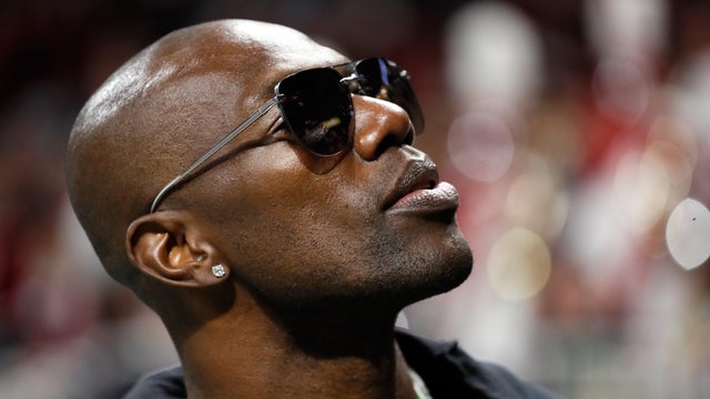 Former NFL player Terrell Owens looks on during the first half of the College Football Playoff National Championship between the Georgia Bulldogs and the Alabama Crimson Tide at Mercedes-Benz Stadium on Jan. 8, 2018, in Atlanta, Georgia. 