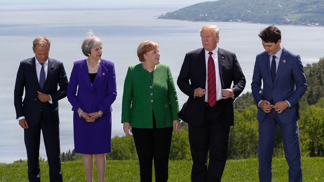 Leaders pose during a family photo at the G7 Summit in the Charlevoix city of La Malbaie 