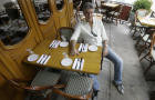 Anthony Bourdain, host of the Travel Channel's "No Reservations," poses in a New York restaurant Aug. 8, 2007. 