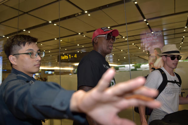 Retired American professional basketball player Dennis Rodman arrives at Changi International airport ahead of the U.S.-North Korea summit in Singapore on June 11, 2018. 