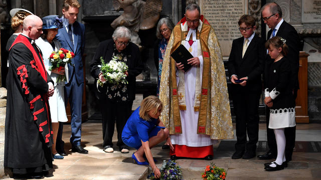 Dean of Westminster John Hall presides over the interment of the ashes of British scientist Stephen Hawking during a memorial service at Westminster Abbey in London 
